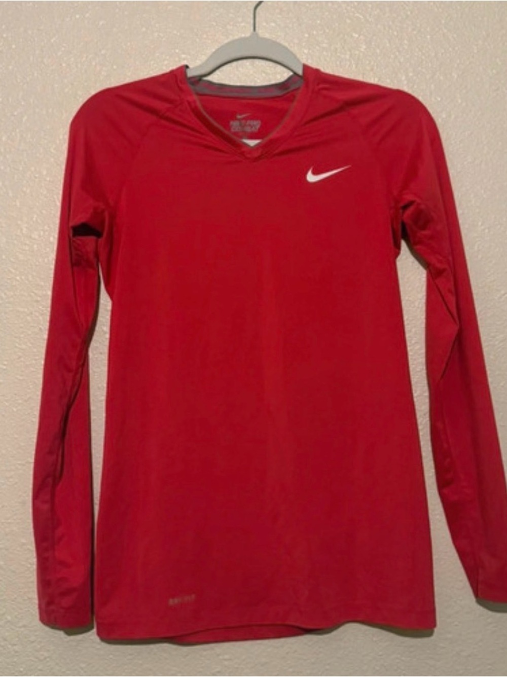 Nike Red Long Sleeve Performance Top with White Swoosh